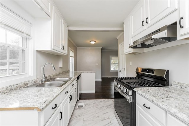 1381 Benteen Way SE, Atlanta, GA 30315 - kitchen with stainless steel range with gas cooktop, under cabinet range hood, a sink, white cabinetry, and light marble finish flooring