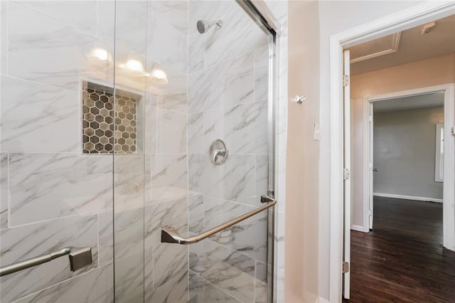 1381 Benteen Way SE, Atlanta, GA 30315 - full bath featuring a marble finish shower, wood finished floors, and baseboards