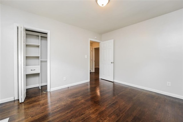 1381 Benteen Way SE, Atlanta, GA 30315 - unfurnished bedroom featuring wood finished floors, baseboards, and a closet