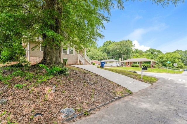 1381 Benteen Way SE, Atlanta, GA 30315 - view of yard featuring driveway and stairs