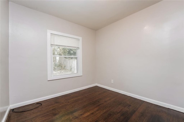 1381 Benteen Way SE, Atlanta, GA 30315 - empty room featuring baseboards and dark wood-type flooring