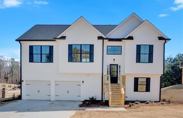 19 Bridgemill Dr, Douglasville, GA 30134 - view of front of property featuring driveway, a garage, and roof with shingles