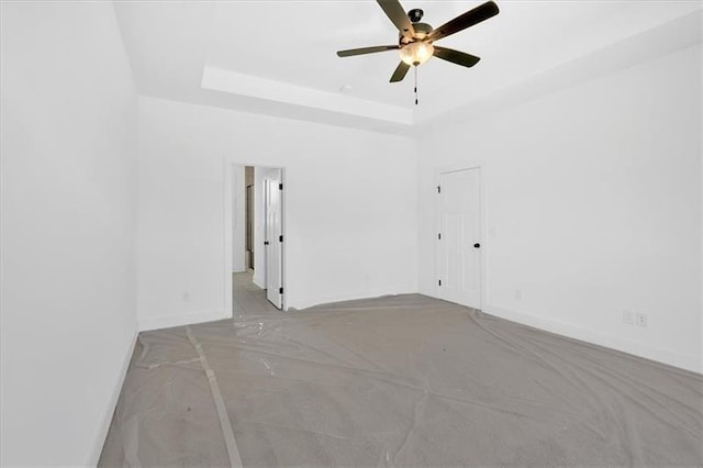 19 Bridgemill Dr, Douglasville, GA 30134 - spare room featuring ceiling fan and a raised ceiling