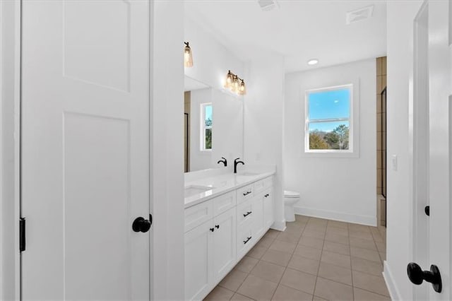 19 Bridgemill Dr, Douglasville, GA 30134 - full bathroom with double vanity, tile patterned flooring, and an enclosed shower