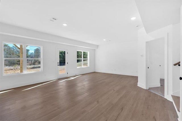 19 Bridgemill Dr, Douglasville, GA 30134 - unfurnished living room with wood finished floors and recessed lighting