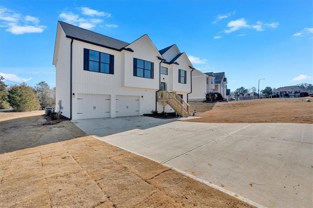 19 Bridgemill Dr, Douglasville, GA 30134 - view of front of house with an attached garage, driveway, and a residential view