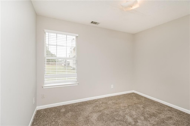155 Oak Terrace Dr, Covington, GA 30016 - empty room featuring carpet flooring and baseboards