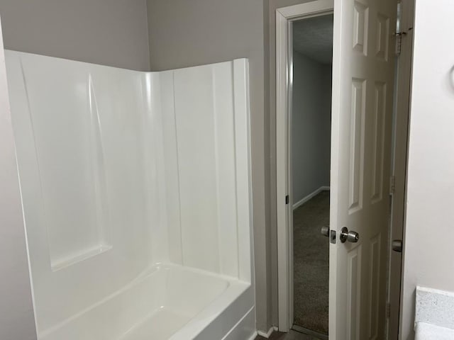 bathroom with shower / bathing tub combination