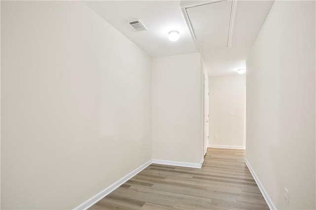 4130 Stonecypher Rd, Suwanee, GA 30024 - hallway with attic access and light wood-style floors