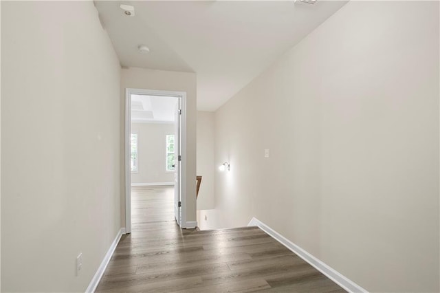 4130 Stonecypher Rd, Suwanee, GA 30024 - hallway with an upstairs landing and wood finished floors