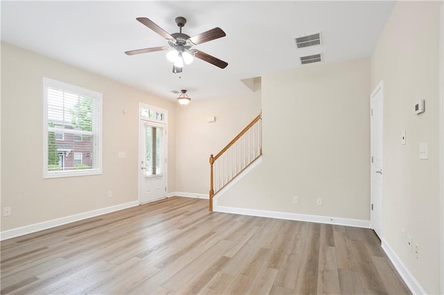 4130 Stonecypher Rd, Suwanee, GA 30024 - entrance foyer featuring stairway, light wood-style floors, and ceiling fan