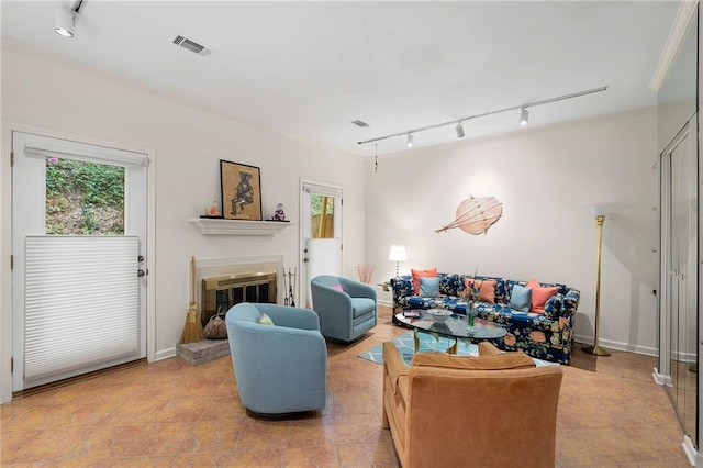 5180 Chemin De Vie, Atlanta, GA 30342 - living area featuring track lighting and a brick fireplace