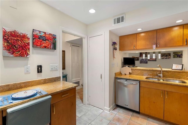 5180 Chemin De Vie, Atlanta, GA 30342 - kitchen featuring stainless steel dishwasher, a sink, light tile patterned floors, brown cabinets, and stove