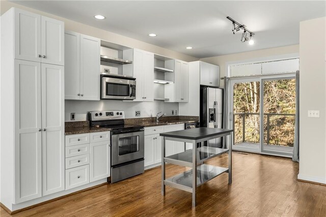 dining area with light hardwood / wood-style floors