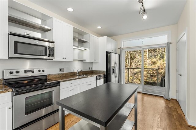 dining area with dark hardwood / wood-style flooring