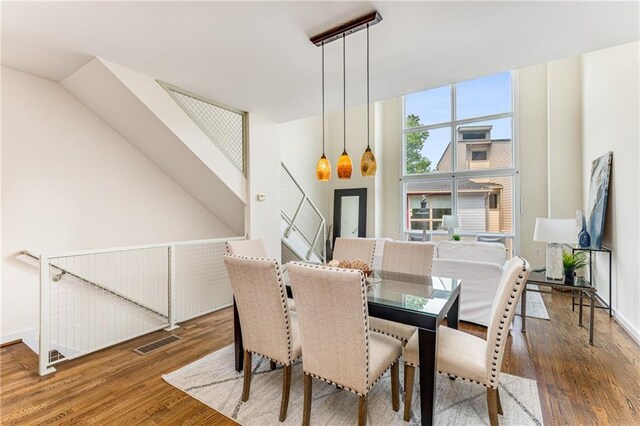 dining area featuring hardwood / wood-style floors