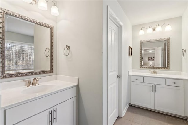 bathroom featuring vanity and tile patterned flooring