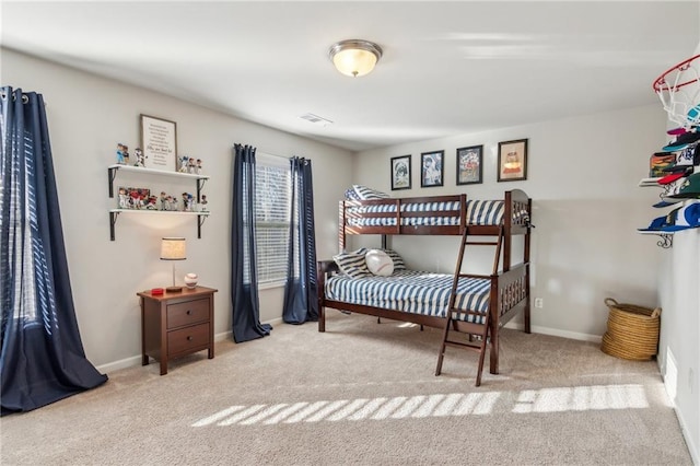 bedroom with light carpet