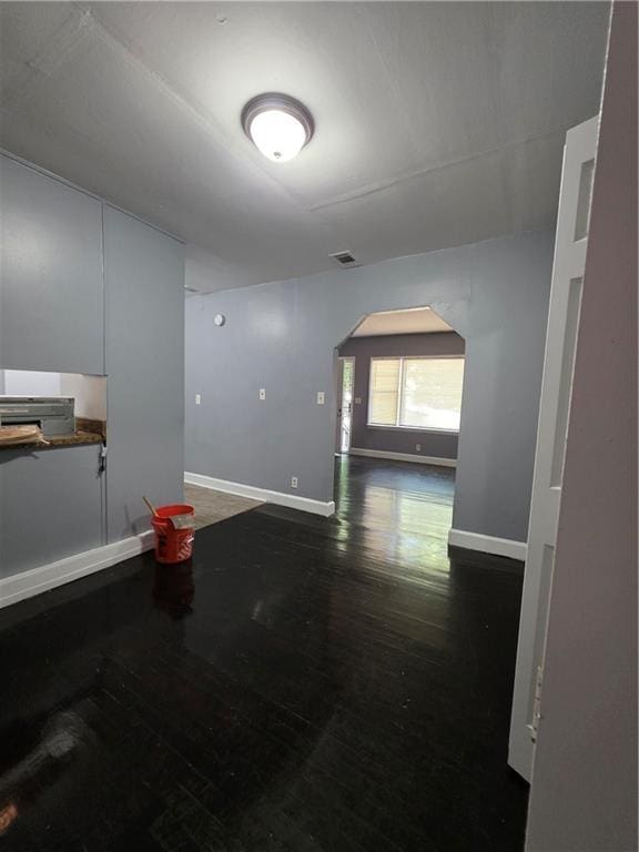 2802 3rd Ave SW, Atlanta, GA 30315 - unfurnished room featuring arched walkways and wood finished floors