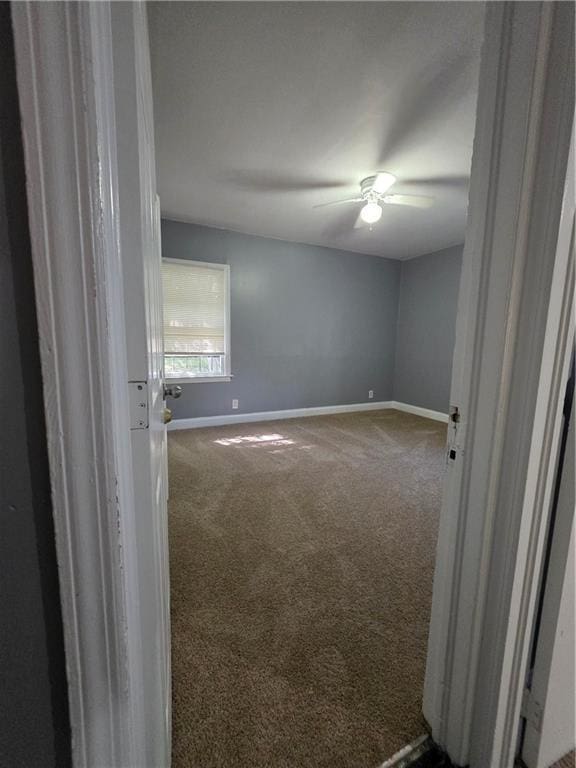 2802 3rd Ave SW, Atlanta, GA 30315 - carpeted empty room featuring baseboards and a ceiling fan