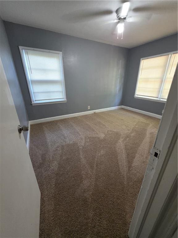 2802 3rd Ave SW, Atlanta, GA 30315 - empty room with carpet floors and a ceiling fan