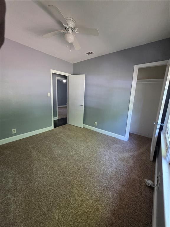 2802 3rd Ave SW, Atlanta, GA 30315 - unfurnished bedroom with carpet floors, a ceiling fan, and a closet