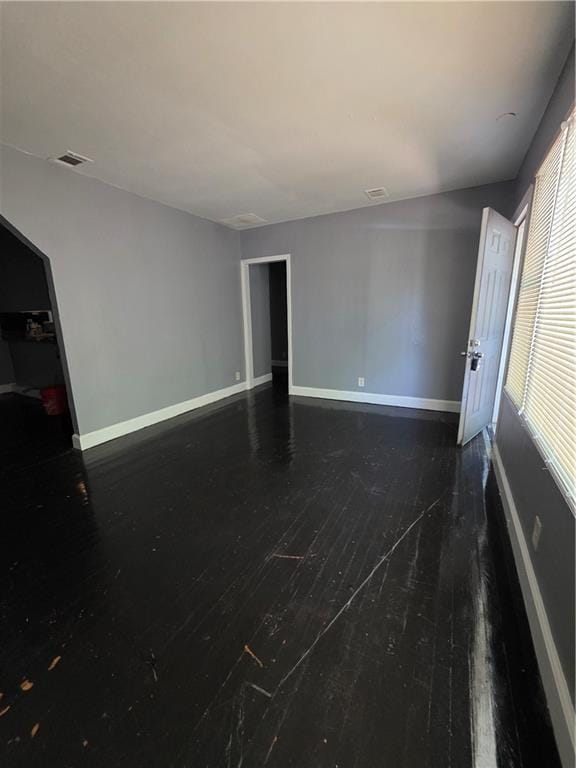 2802 3rd Ave SW, Atlanta, GA 30315 - spare room with baseboards and wood finished floors