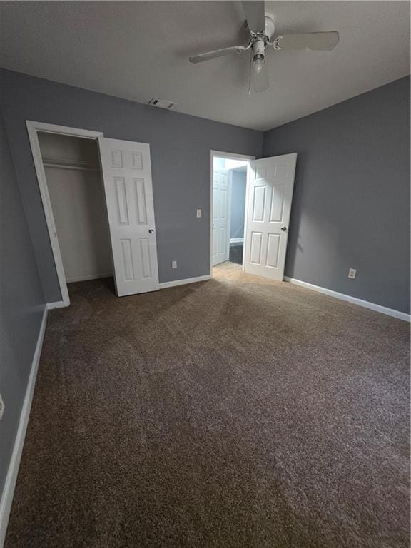 2802 3rd Ave SW, Atlanta, GA 30315 - unfurnished bedroom featuring carpet floors, a closet, and ceiling fan
