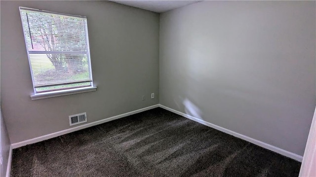 3900 Ferncliff Rd, Snellville, GA 30039 - unfurnished room featuring dark colored carpet and baseboards