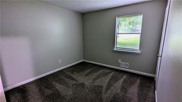 3900 Ferncliff Rd, Snellville, GA 30039 - spare room featuring dark colored carpet and baseboards