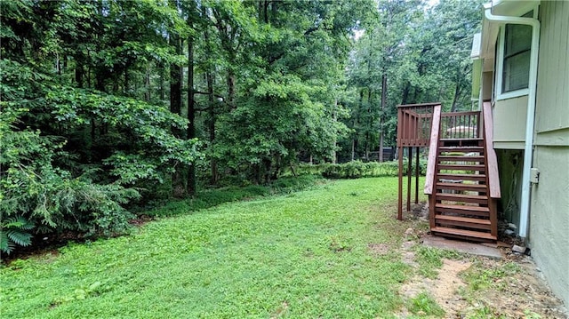 3900 Ferncliff Rd, Snellville, GA 30039 - view of green lawn with stairway and a wooden deck
