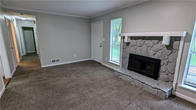 3900 Ferncliff Rd, Snellville, GA 30039 - unfurnished living room with carpet floors, ornamental molding, healthy amount of natural light, and a stone fireplace