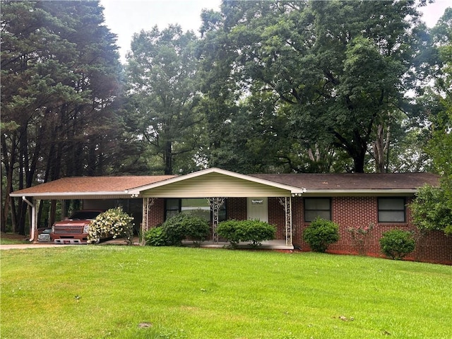 991 Lakemont Dr, Gainesville, GA 30501 - ranch-style house with a carport, a front yard, and brick siding