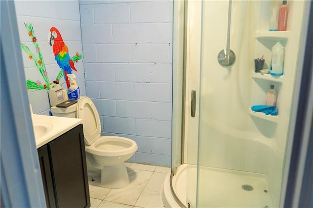 991 Lakemont Dr, Gainesville, GA 30501 - full bathroom with vanity, a stall shower, toilet, and concrete block wall
