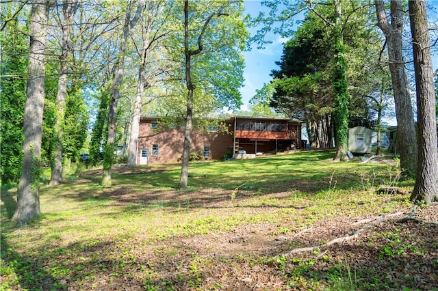 991 Lakemont Dr, Gainesville, GA 30501 - view of green lawn with a wooden deck