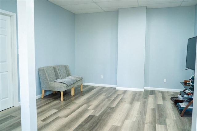 991 Lakemont Dr, Gainesville, GA 30501 - living area featuring a paneled ceiling, wood finished floors, and baseboards