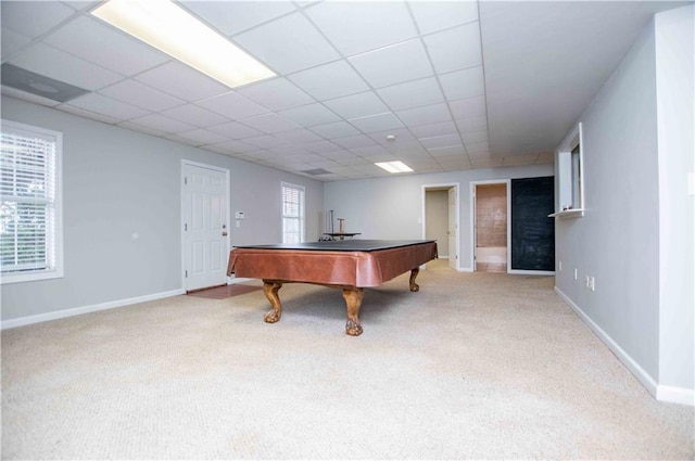 playroom featuring carpet, baseboards, and a paneled ceiling