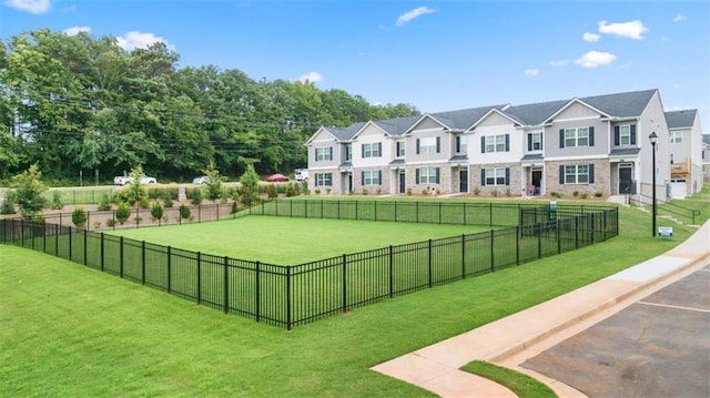 townhome / multi-family property featuring a garage