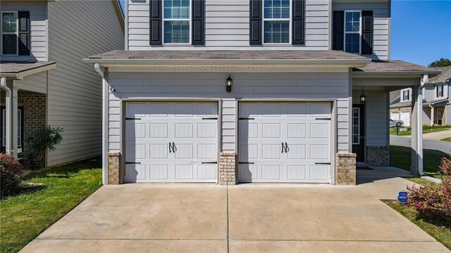 garage with driveway