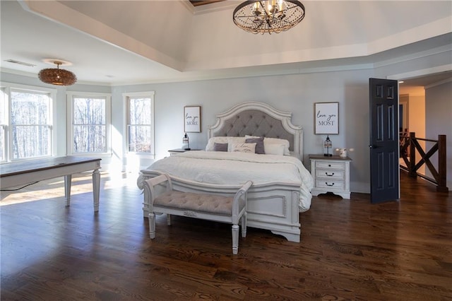 bedroom featuring dark wood-style floors, a chandelier, and visible vents