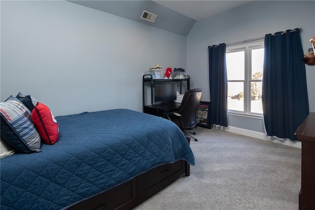 carpeted bedroom featuring vaulted ceiling, visible vents, and baseboards