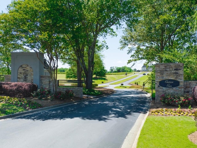 view of street featuring curbs