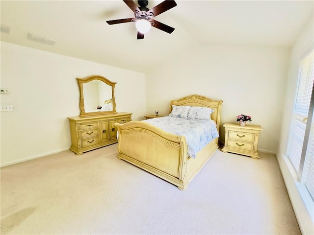 365 Friars Head Dr, Suwanee, GA 30024 - bedroom featuring light colored carpet, vaulted ceiling, multiple windows, and baseboards