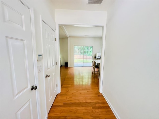 365 Friars Head Dr, Suwanee, GA 30024 - hallway featuring light wood-type flooring and an office area