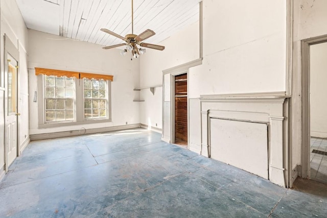 unfurnished living room with ceiling fan