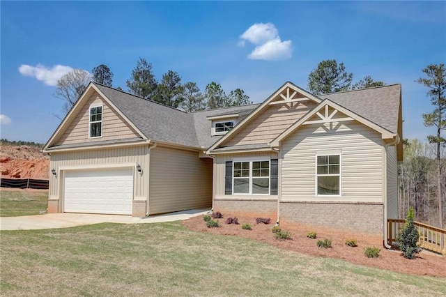 craftsman house with a garage and a front lawn