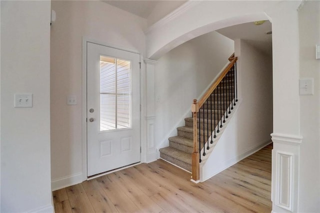 foyer entrance featuring a healthy amount of sunlight and light wood-type flooring