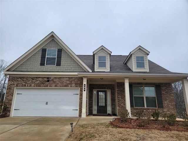 view of front of property with a garage