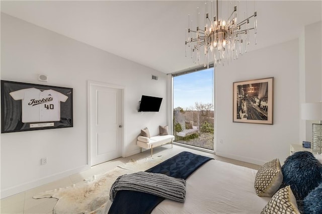 bedroom featuring floor to ceiling windows and a chandelier