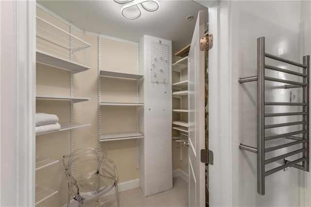 spacious closet with radiator